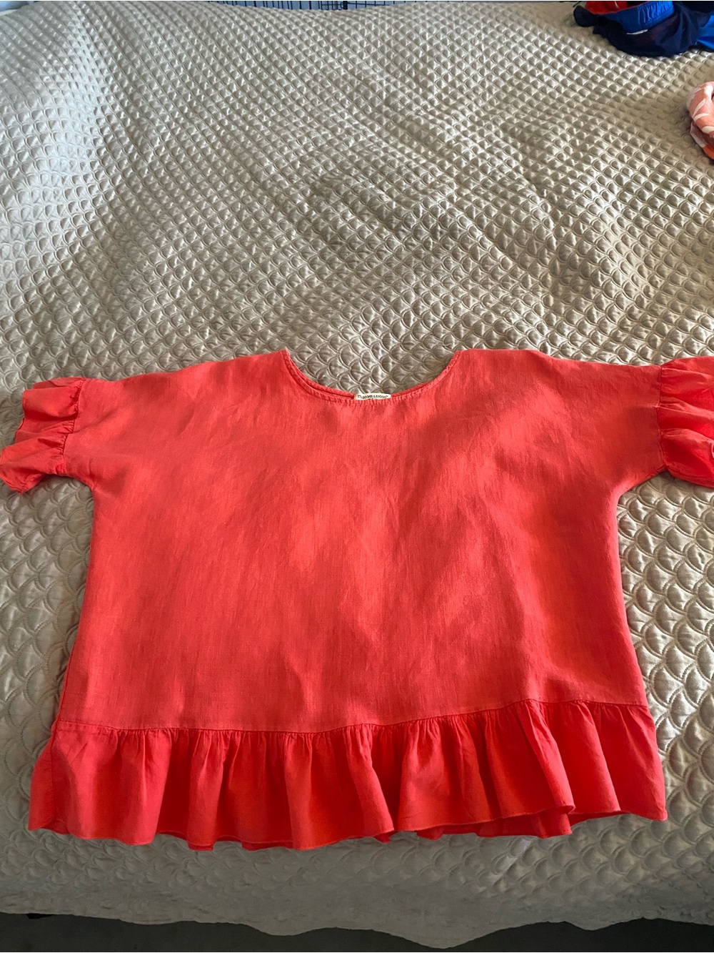 Coral Linen oversized Italian made Ruffle hem women’s blouse.